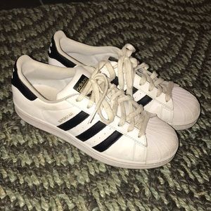 White Adidas Superstars
